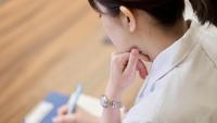 Medical student taking notes